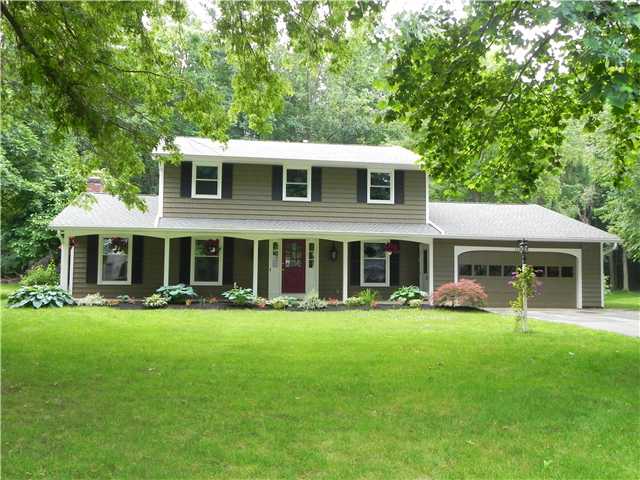 1261 Holley Road Webster, NY 14580 - Photo 1 of 1 Exterior Front beautiful wooded lot with no houses