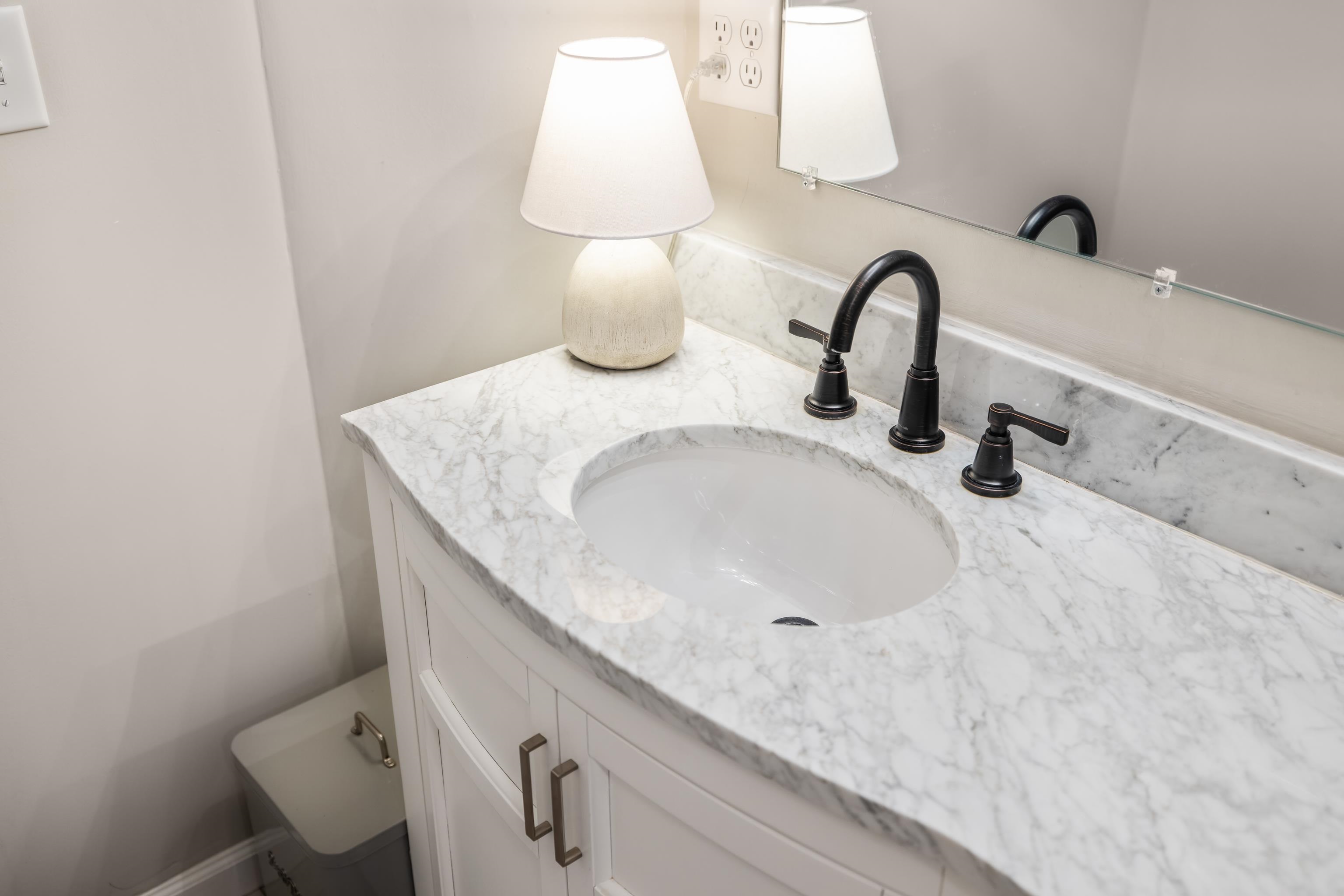 167 Raintree Road Verona, VA 24482 - Photo 29 of 75 a bathroom with a sink and a mirror