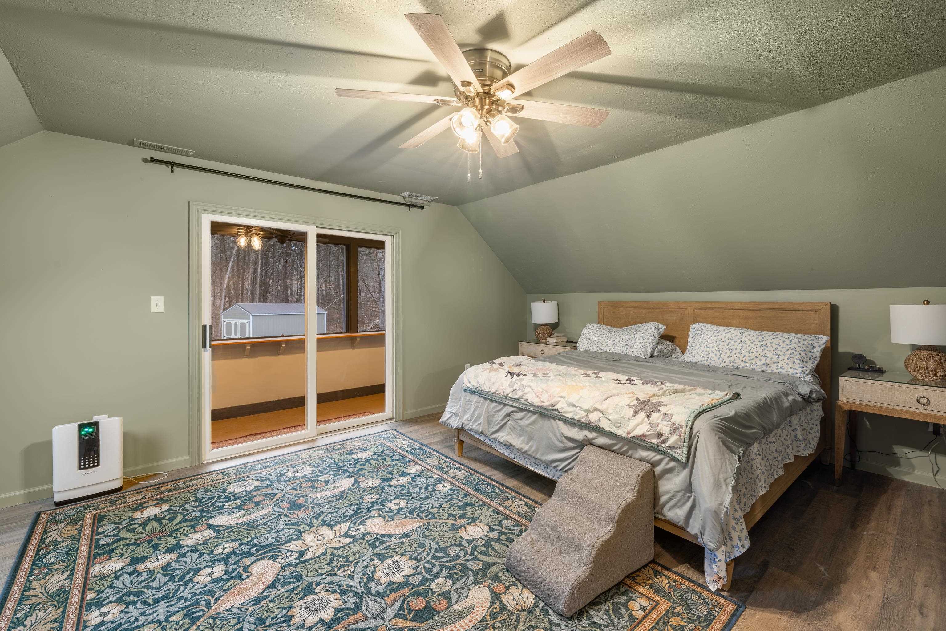 167 Raintree Road Verona, VA 24482 - Photo 33 of 75 a bedroom with a bed and a ceiling fan