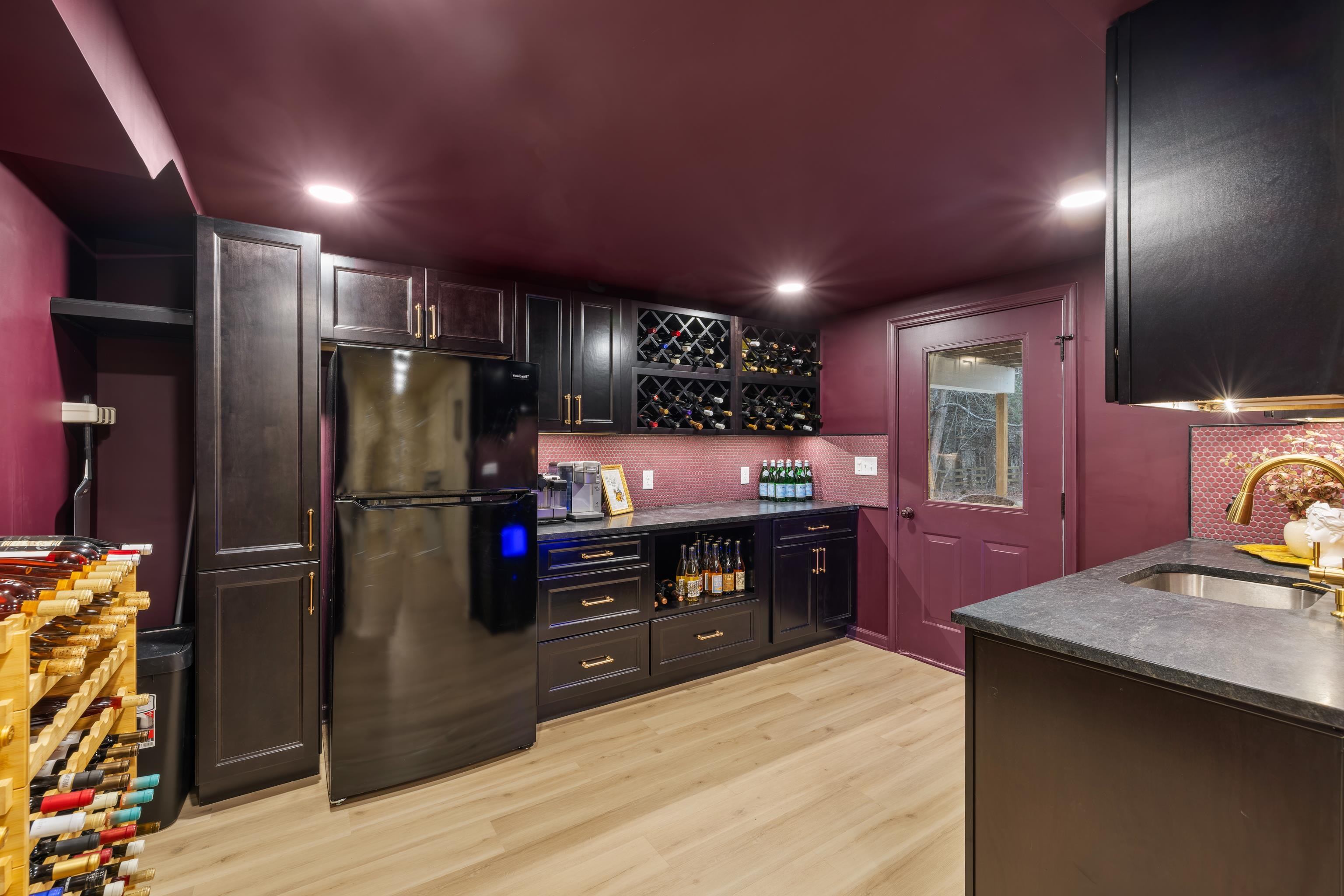167 Raintree Road Verona, VA 24482 - Photo 50 of 75 a kitchen with stainless steel appliances kitchen island granite countertop a refrigerator stove and sink