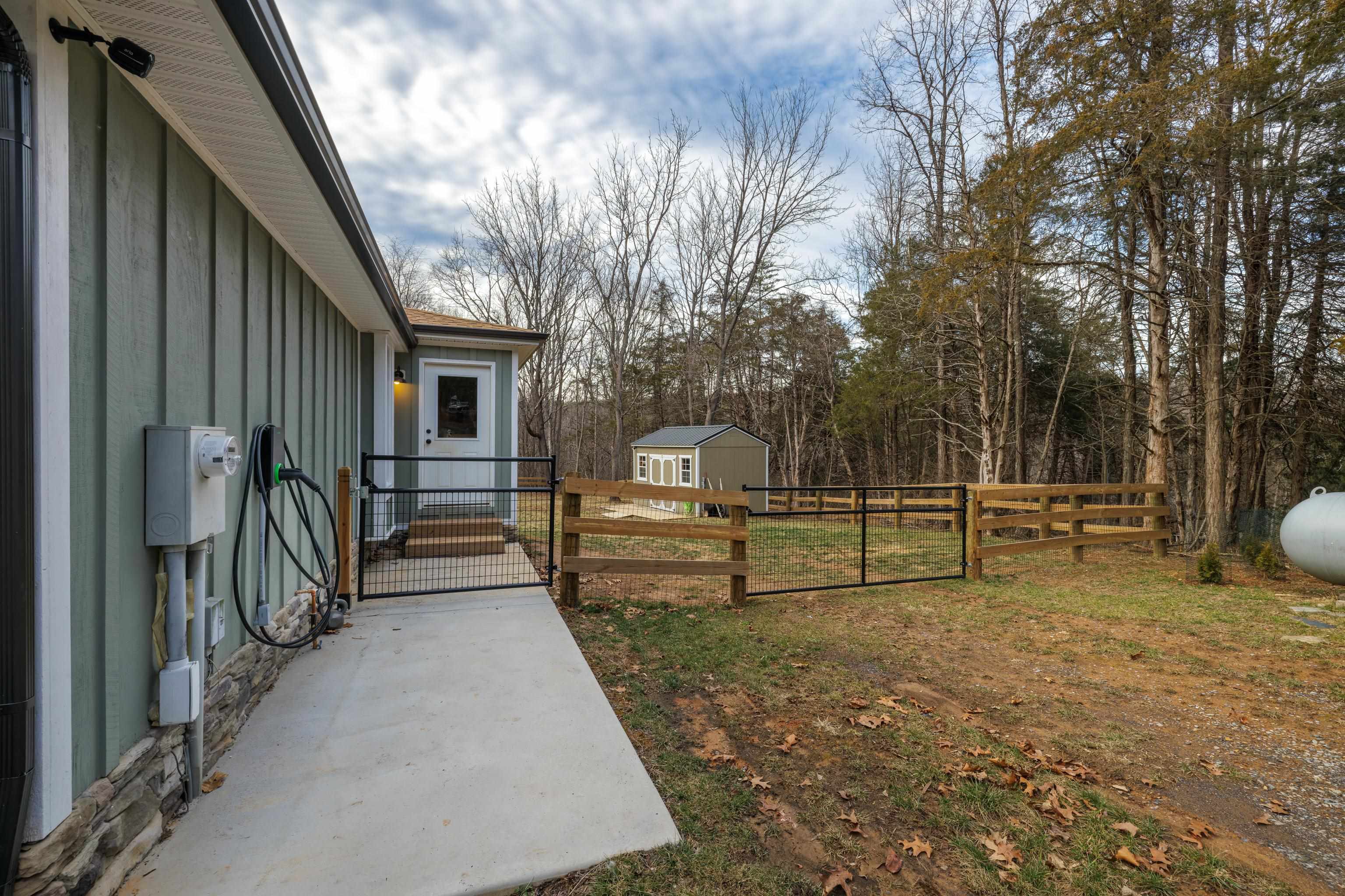 167 Raintree Road Verona, VA 24482 - Photo 64 of 75 a view of a backyard with wooden fence
