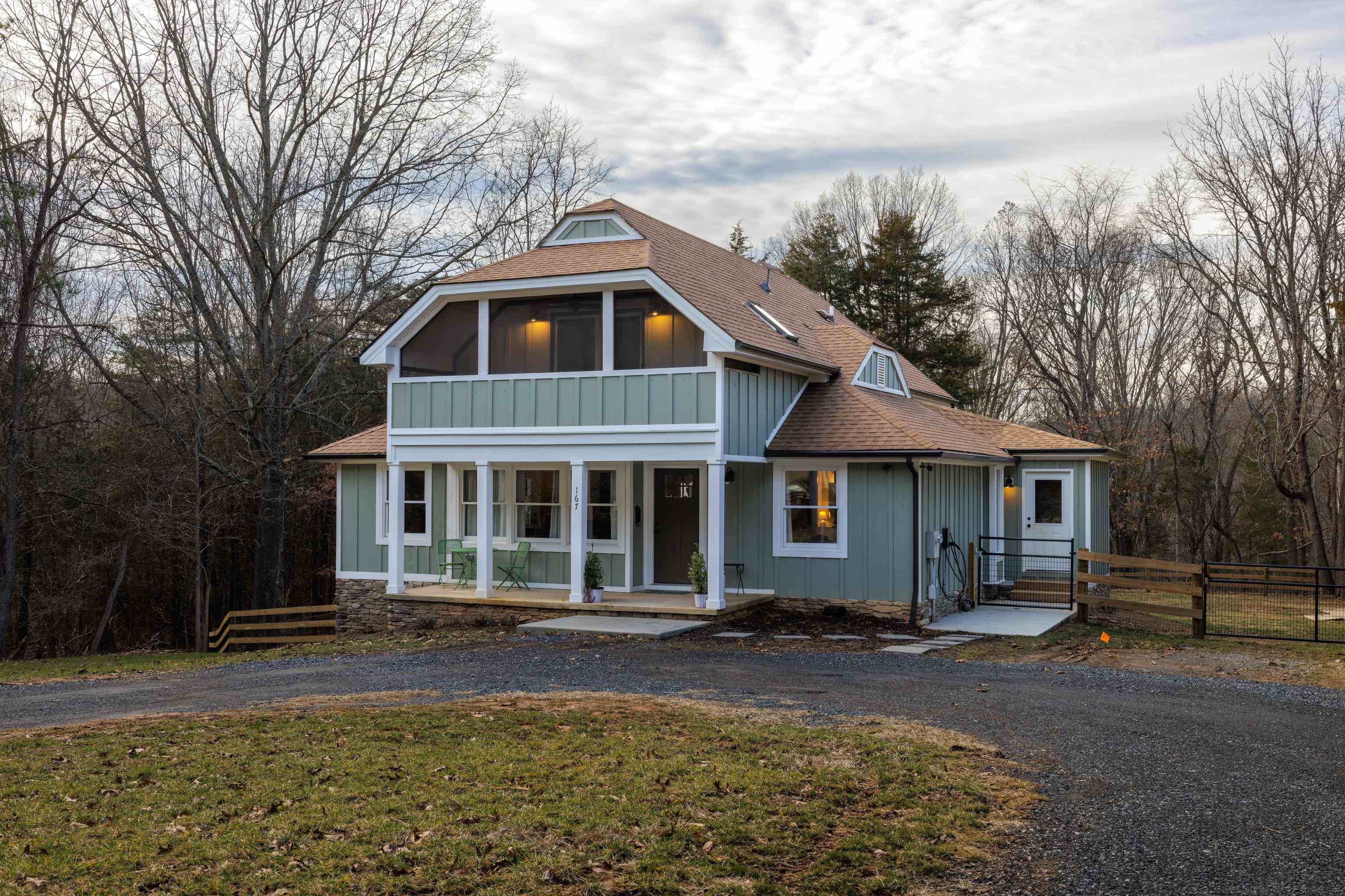 167 Raintree Road Verona, VA 24482 - Photo 69 of 75 a front view of a house with yard and trees