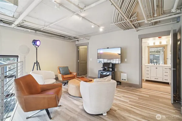 a living room with furniture and a table