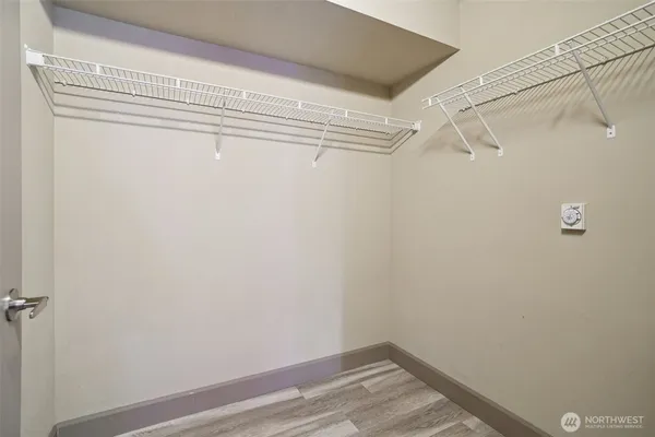 a view of a room with racks on the wall