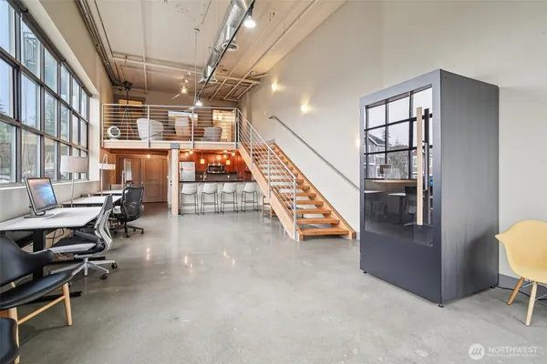 a view of entryway wih livingroom and furniture