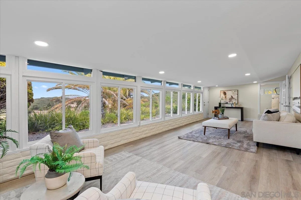 3615 Vista Bella, Unit 30 Oceanside, CA 92057 - Photo 16 of 38 a living room with furniture and windows