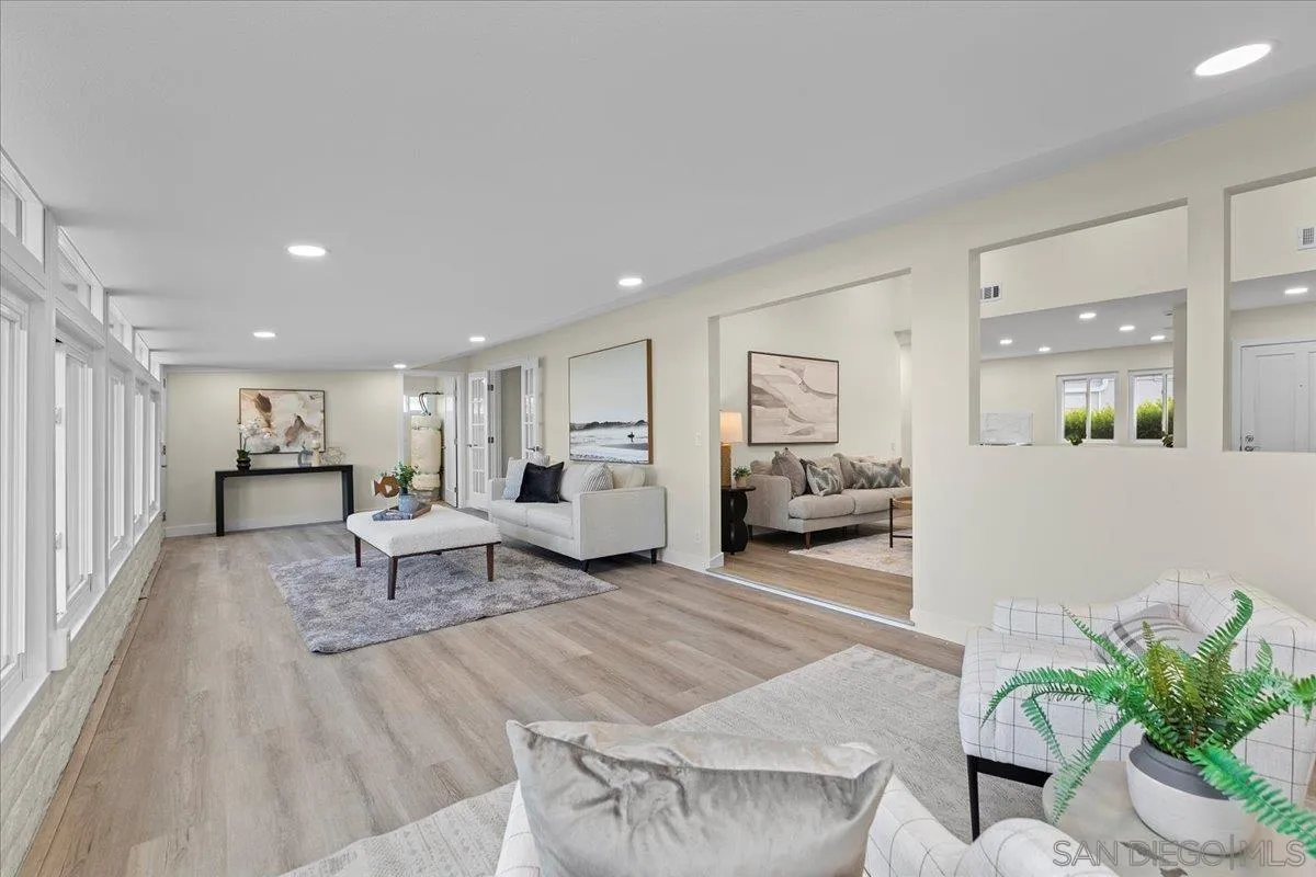 3615 Vista Bella, Unit 30 Oceanside, CA 92057 - Photo 17 of 38 a living room with furniture and a table