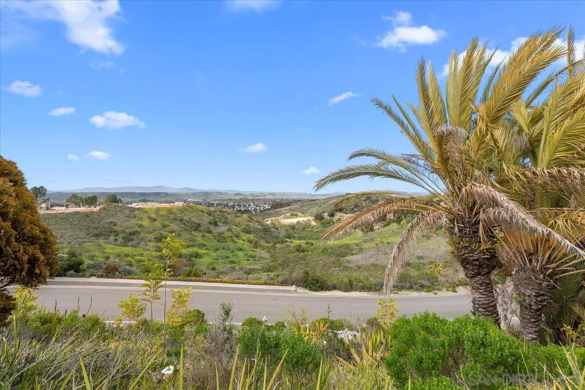 3615 Vista Bella, Unit 30 Oceanside, CA 92057 - Photo 3 of 38 a view of a lake with a yard