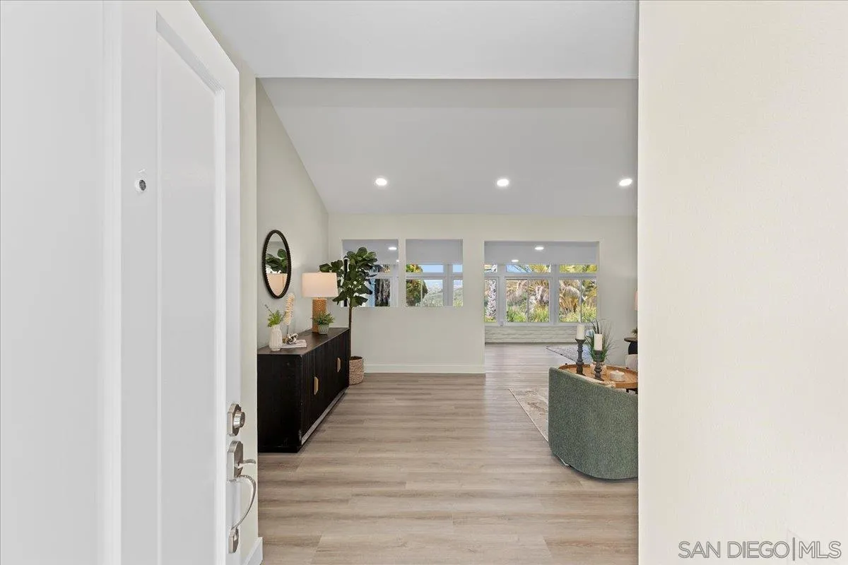3615 Vista Bella, Unit 30 Oceanside, CA 92057 - Photo 5 of 38 a view of a room with wooden floor washer and dryer