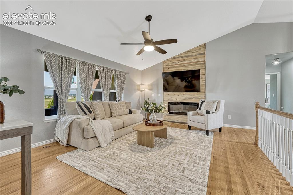 13695 Woodlake Road Elbert, CO 80106 - Photo 6 of 39 Vaulted ceiling, oak floors...
