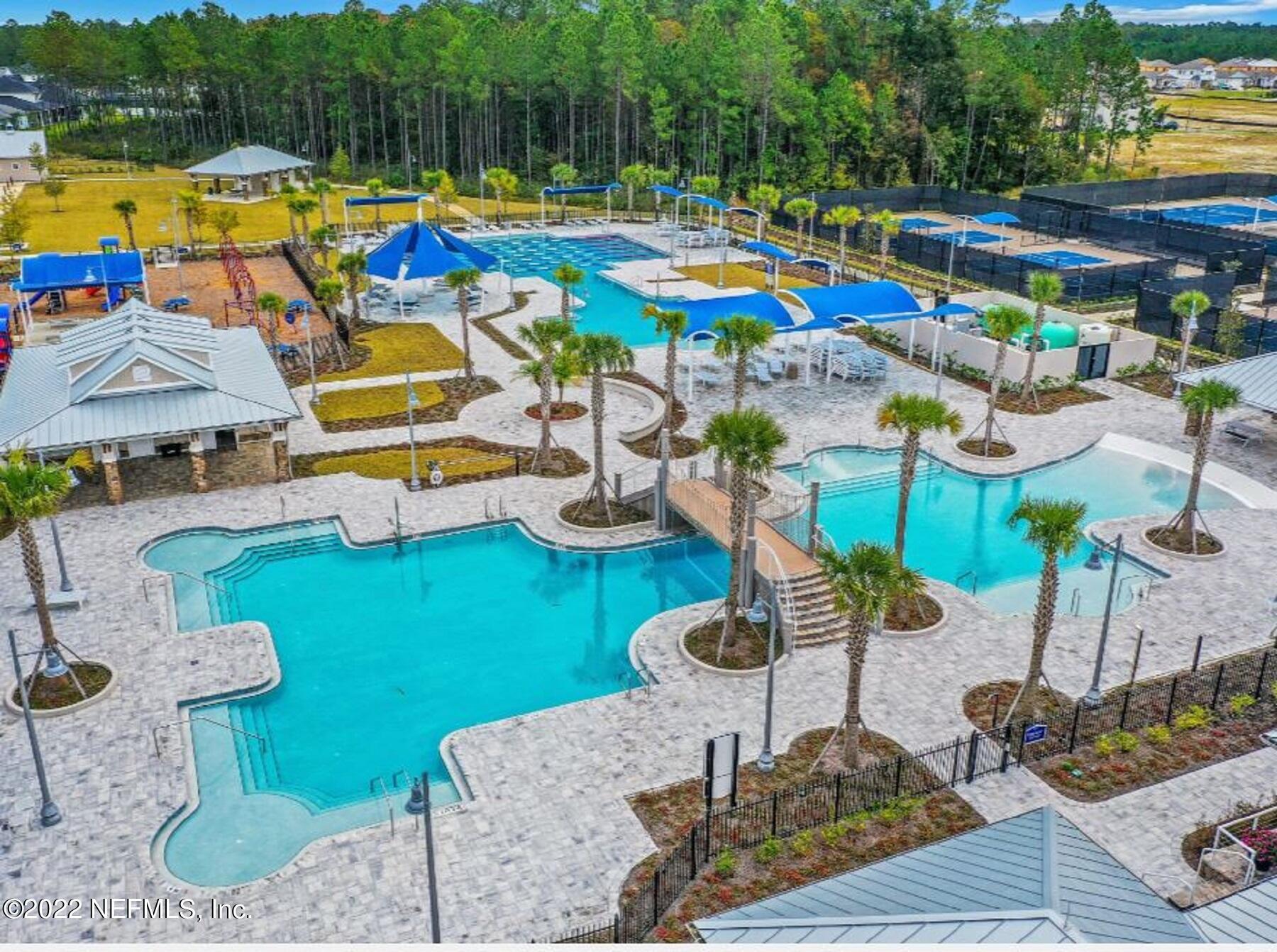 997 Silver Landing Drive, Unit 417 St. Augustine, FL 32092 - Photo 17 of 19 a view of swimming pool with outdoor seating space