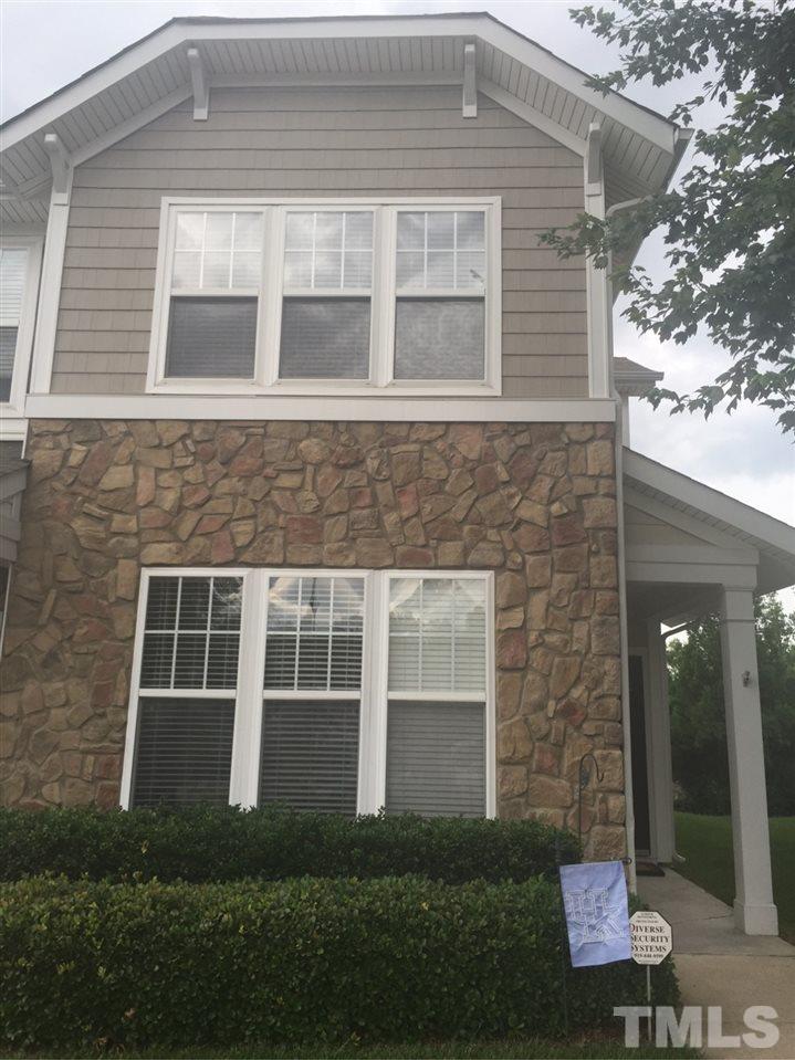 6019 History Trail Raleigh, NC 27612 - Photo 1 of 3 a front view of a house with a yard