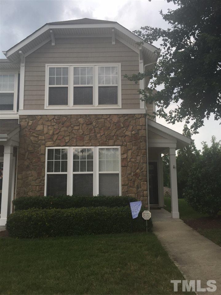 6019 History Trail Raleigh, NC 27612 - Photo 2 of 3 a front view of a house with a yard