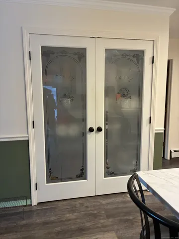 a view of a bathroom with a glass door shower