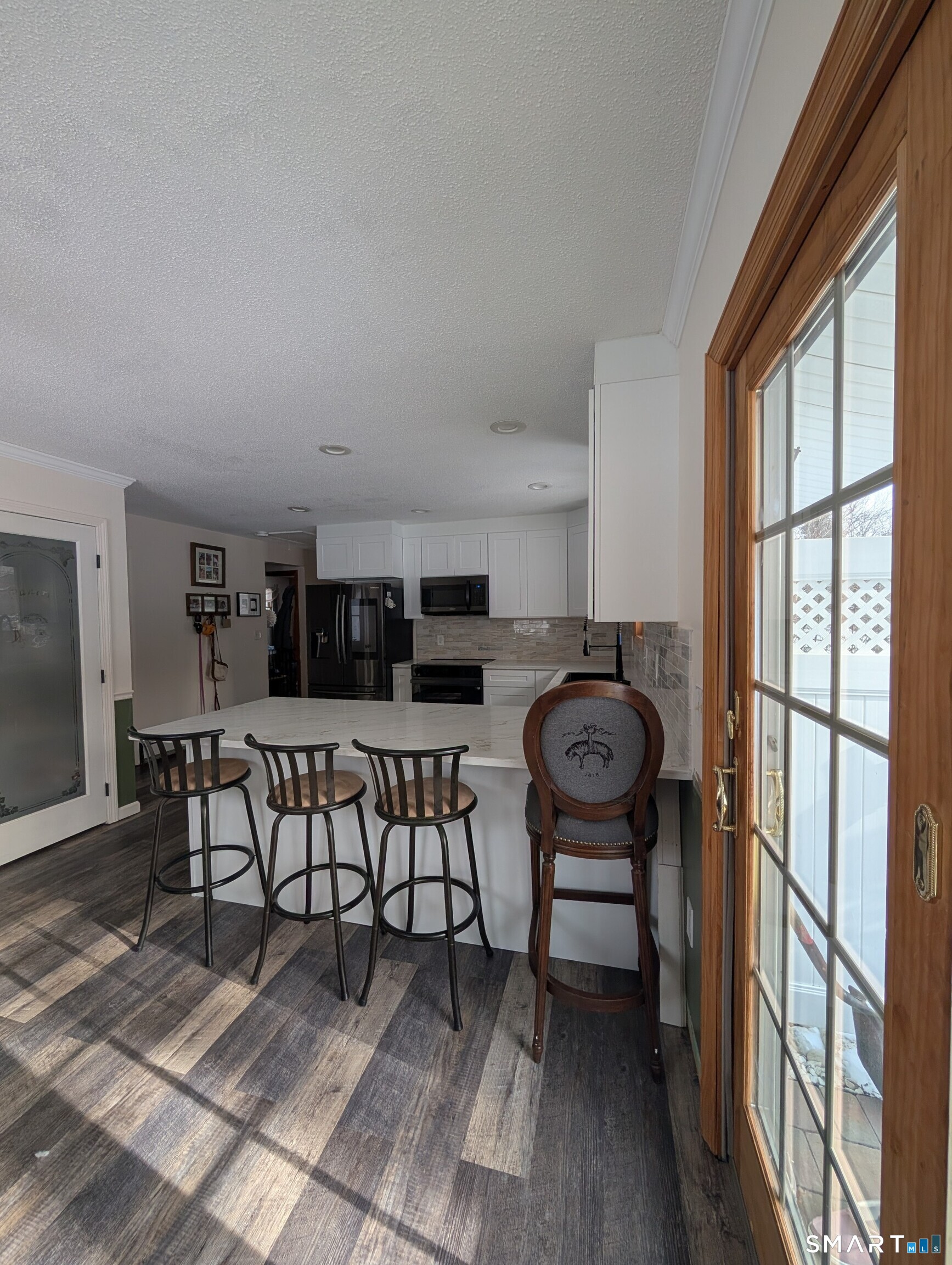 125 North Granby Road Granby, CT 06035 - Photo 13 of 25 a view of a room with furniture window and wooden floor