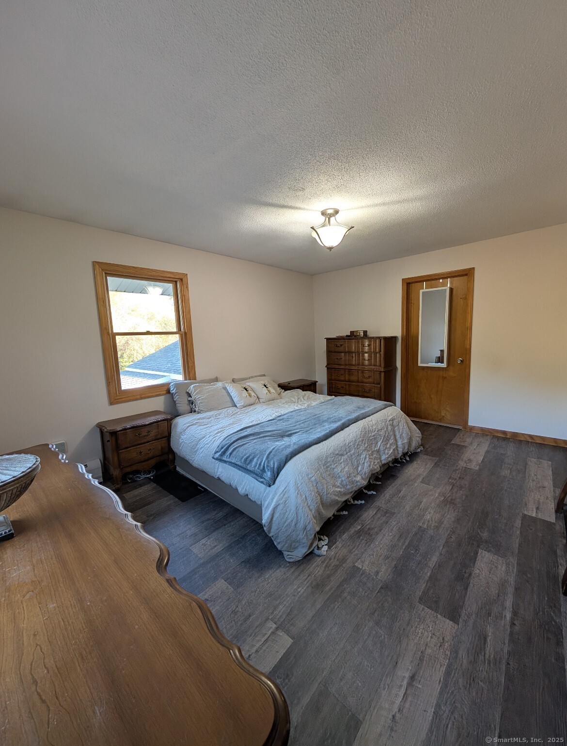 125 North Granby Road Granby, CT 06035 - Photo 22 of 25 a bedroom with double bed and a window