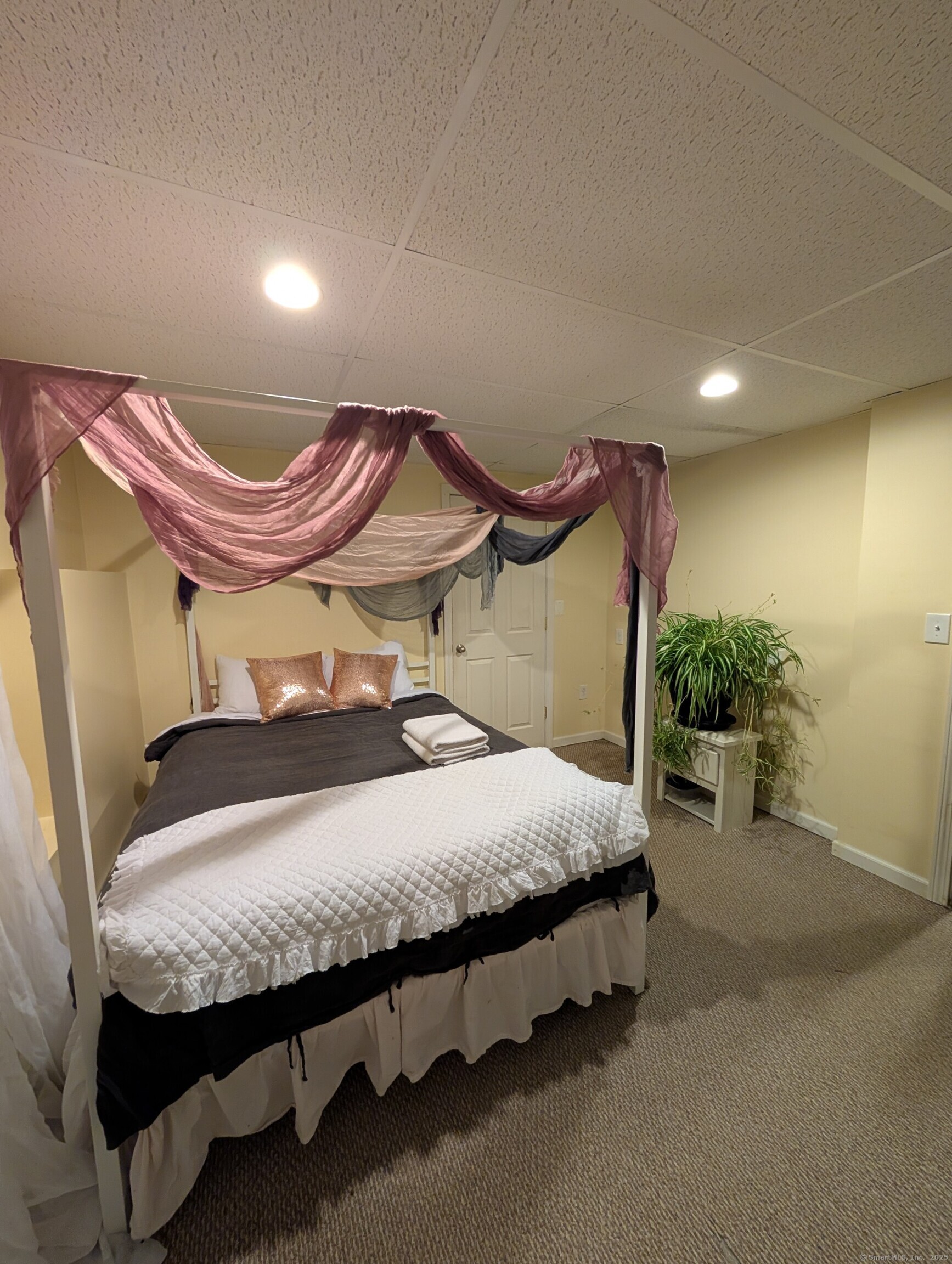 125 North Granby Road Granby, CT 06035 - Photo 23 of 25 a bedroom with a bed and a mirror