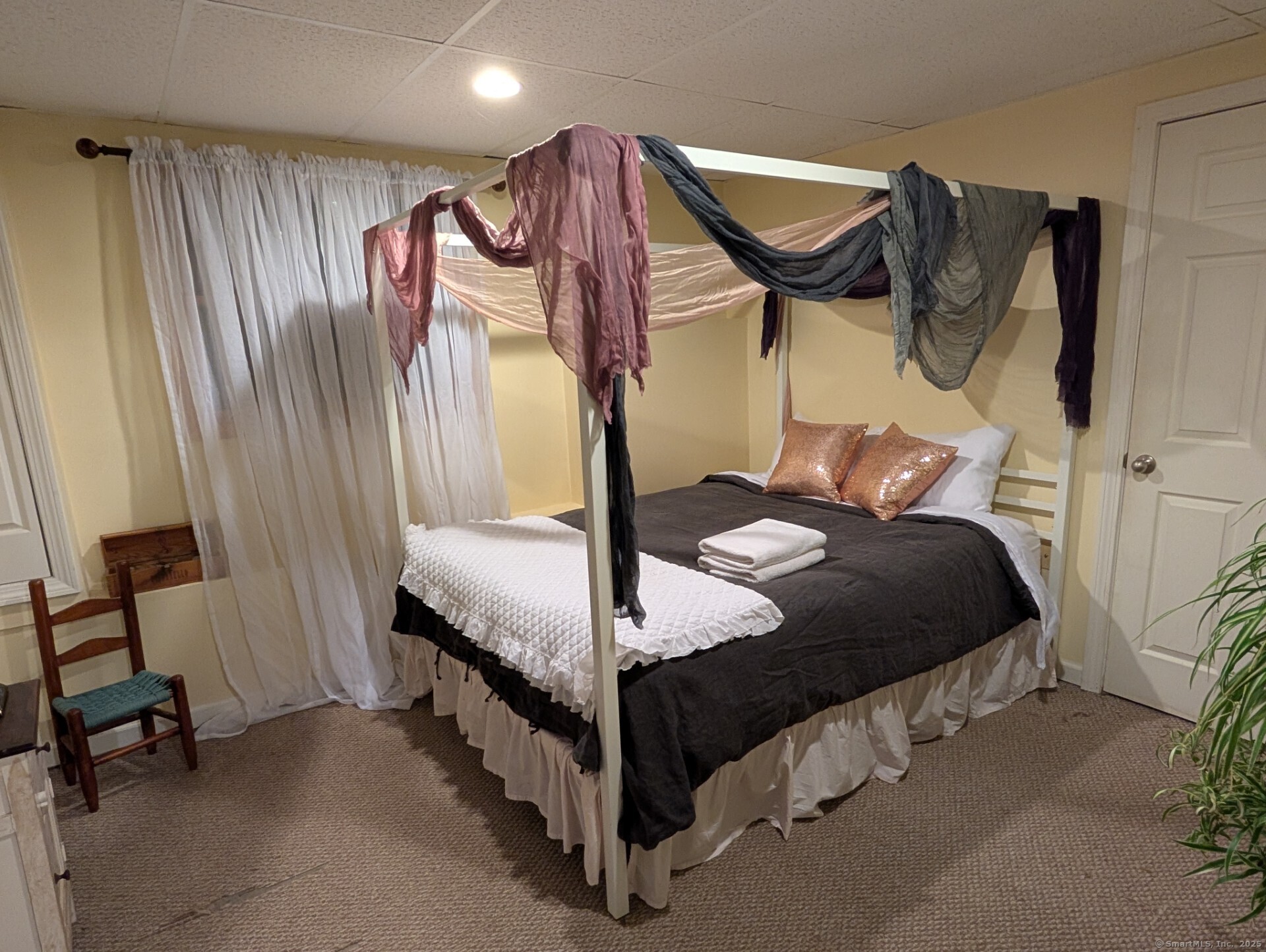 125 North Granby Road Granby, CT 06035 - Photo 25 of 25 a bedroom with a bed and a mirror