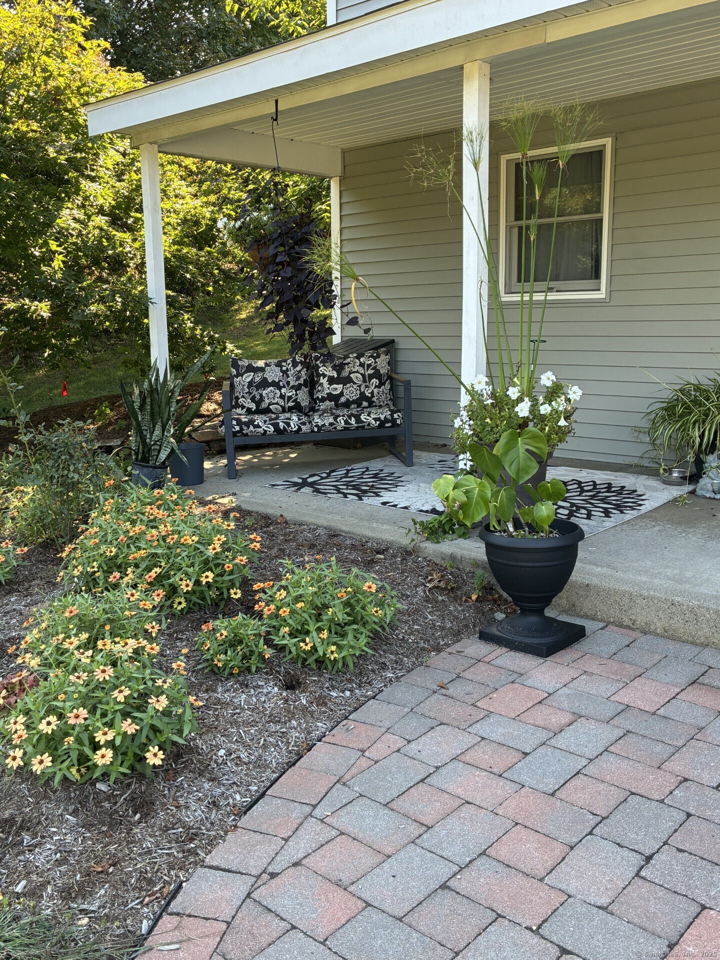 125 North Granby Road Granby, CT 06035 - Photo 3 of 25 a view of a backyard with potted plants