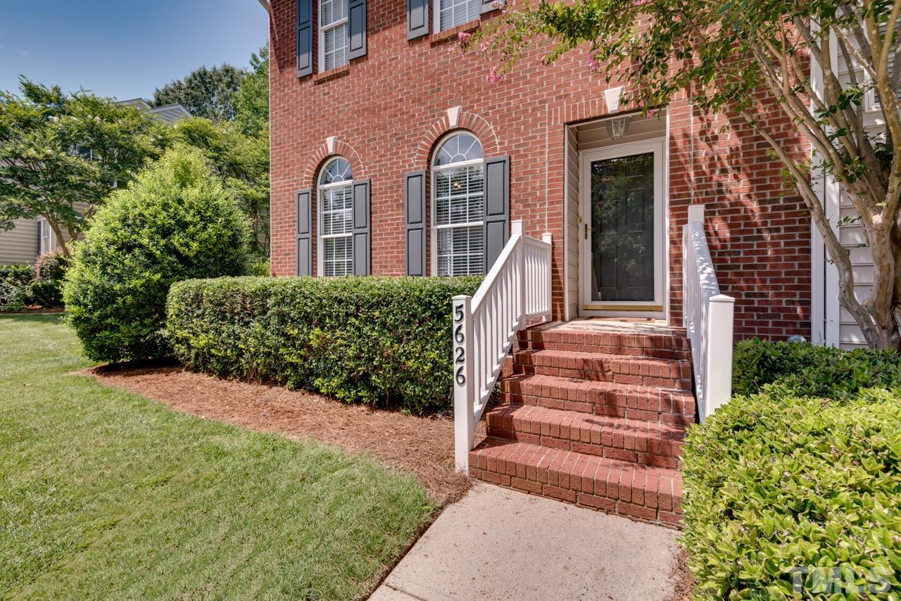 5626 Slide Rock Lane Raleigh, NC 27613 - Photo 3 of 46 front view of a house with a yard