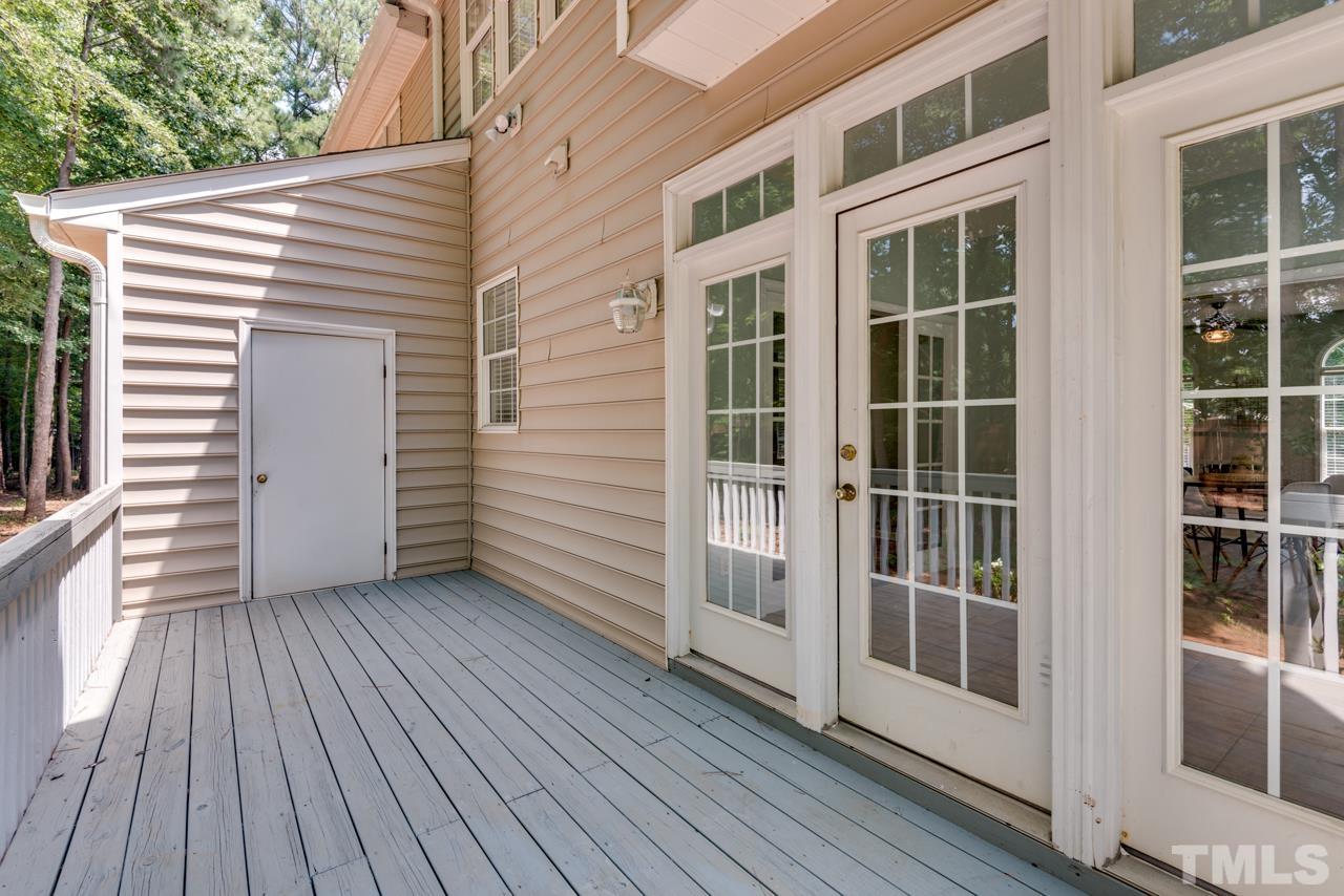 5626 Slide Rock Lane Raleigh, NC 27613 - Photo 44 of 46 a view of a house with a deck