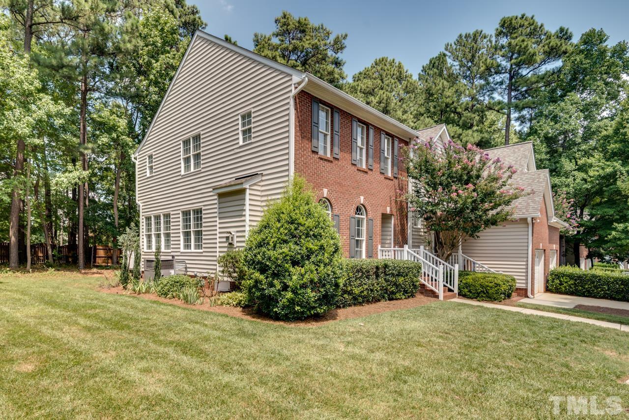 5626 Slide Rock Lane Raleigh, NC 27613 - Photo 45 of 46 a front view of a house with a yard
