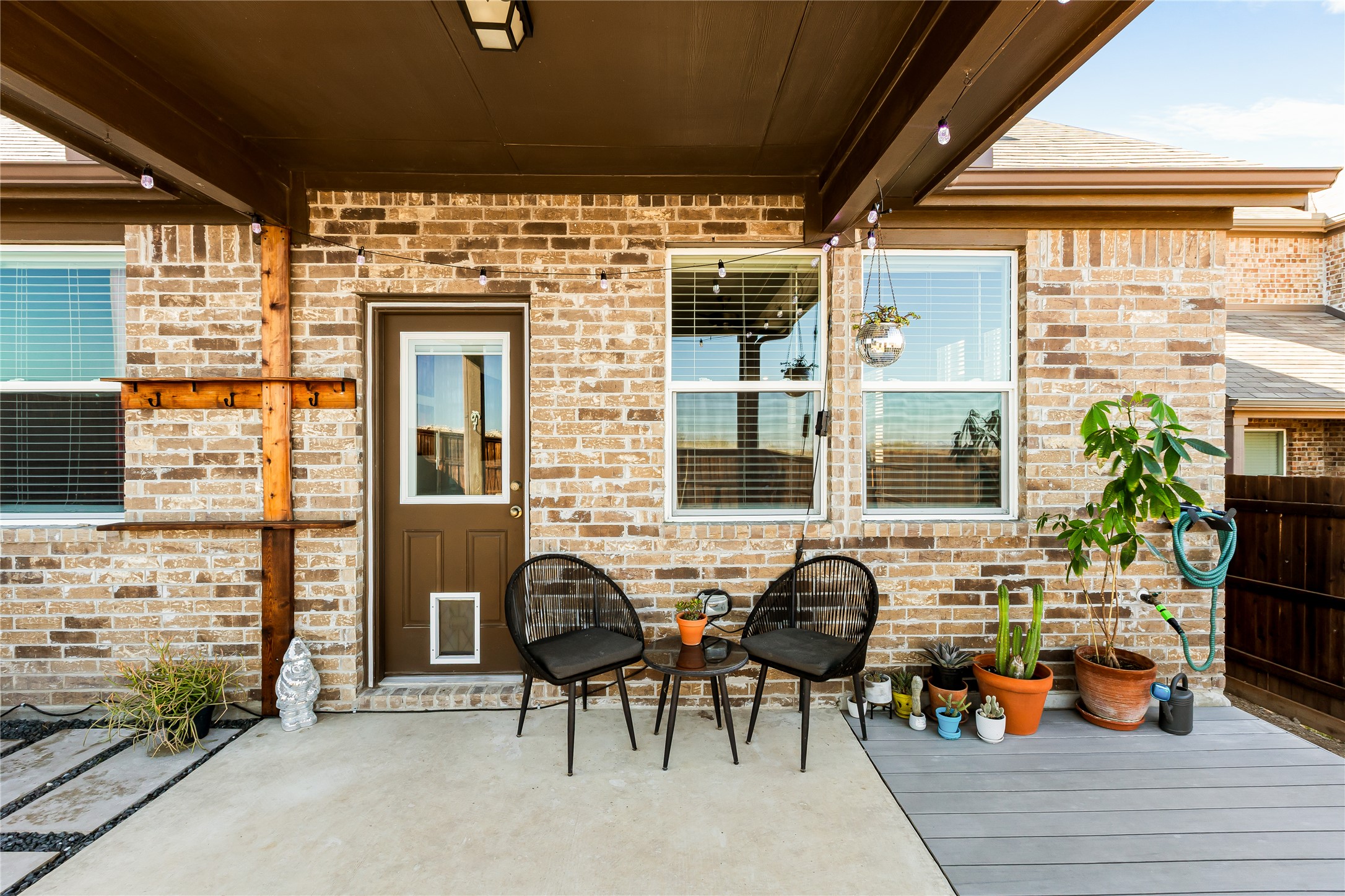 862 Pepperbark Loop Buda, TX 78610 - Photo 32 of 40 a view of a patio with table and chairs and potted plants
