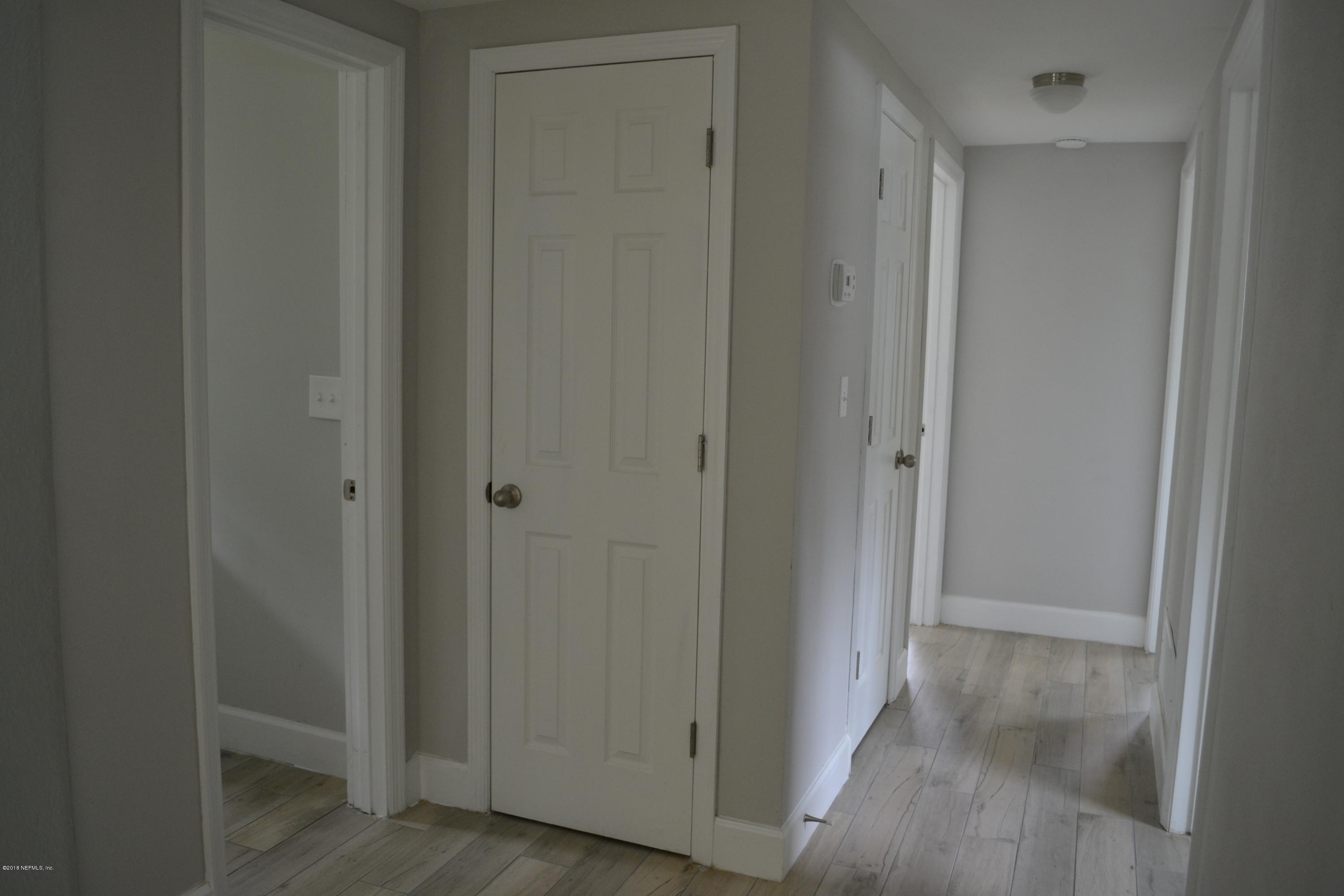 2726 Sam Road Jacksonville, FL 32216 - Photo 13 of 19 a view of a hallway