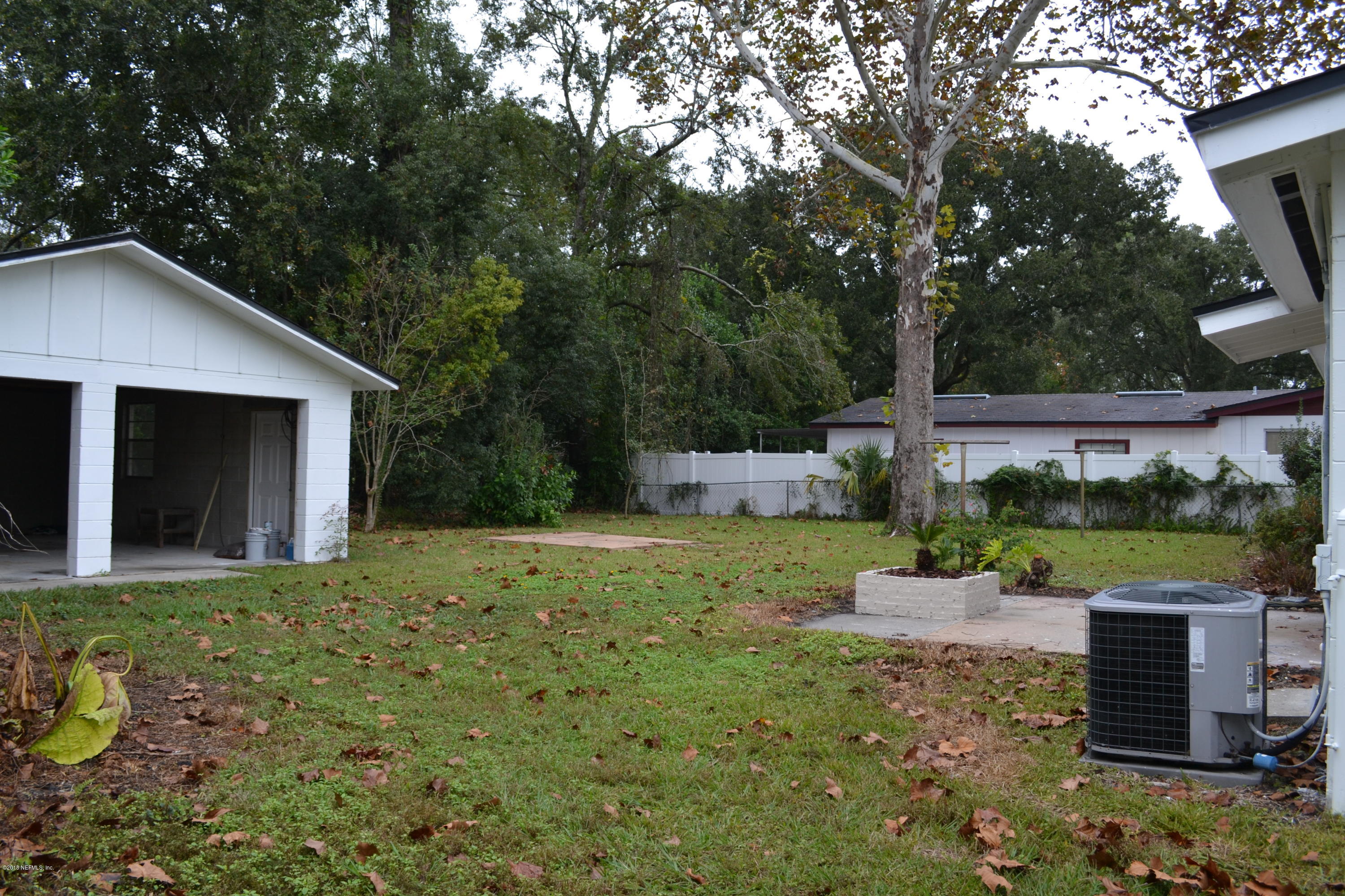 2726 Sam Road Jacksonville, FL 32216 - Photo 3 of 19 a house view with a garden space