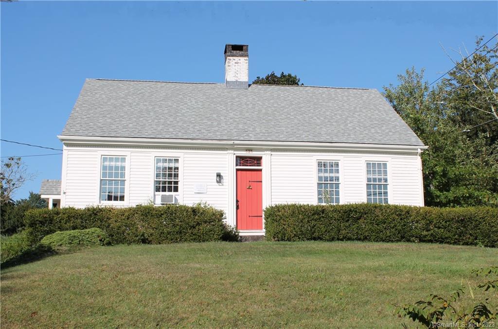 2 Rathbun Place Groton, CT 06355 - Photo 1 of 1 a front view of a house with a yard