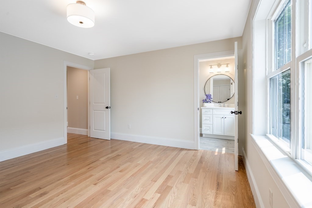 148 Main Street Waltham, MA 02453 - Photo 27 of 42 a view of empty room with wooden floor and fan
