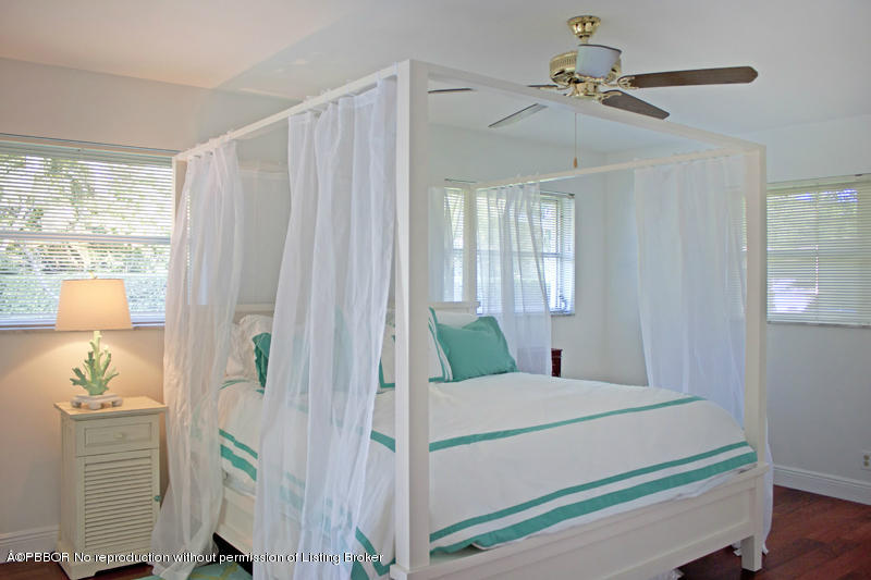 1416 Lands End Road Lantana, FL 33462 - Photo 15 of 21 a bedroom with a bed and window