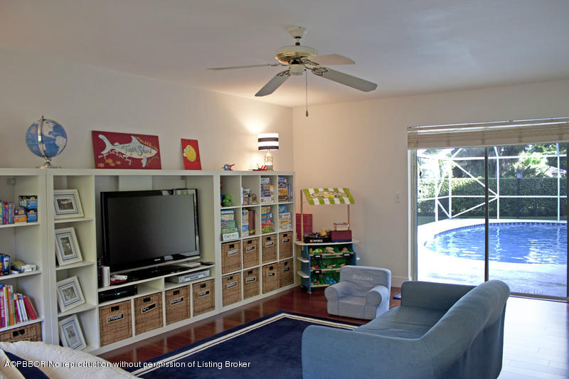 1416 Lands End Road Lantana, FL 33462 - Photo 8 of 21 a living room with furniture and a flat screen tv