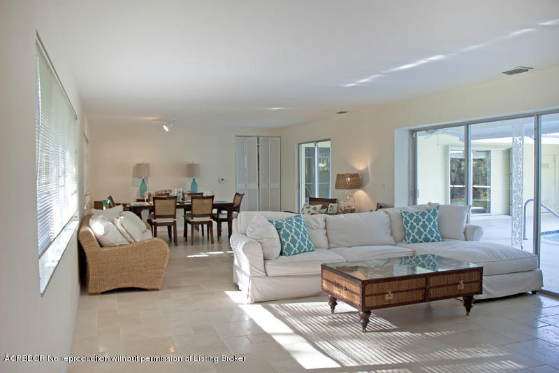 1416 Lands End Road Lantana, FL 33462 - Photo 9 of 21 a living room with furniture and a large window