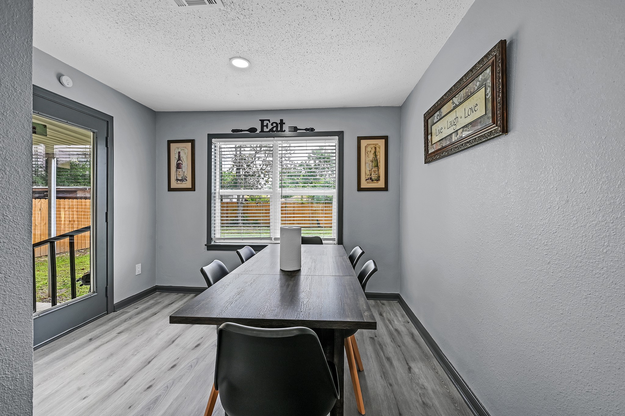 4406 Edison Street Houston, TX 77009 - Photo 10 of 24 a workspace with wooden floor