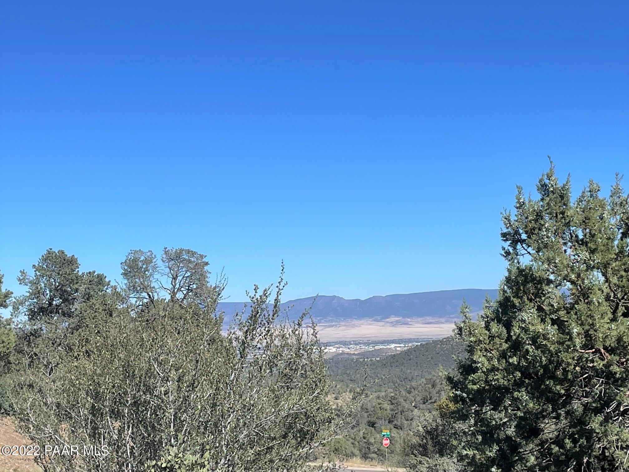 3184 Rainbow Ridge Drive Prescott, AZ 86303 - Photo 2 of 16 a view of a city with sunset view