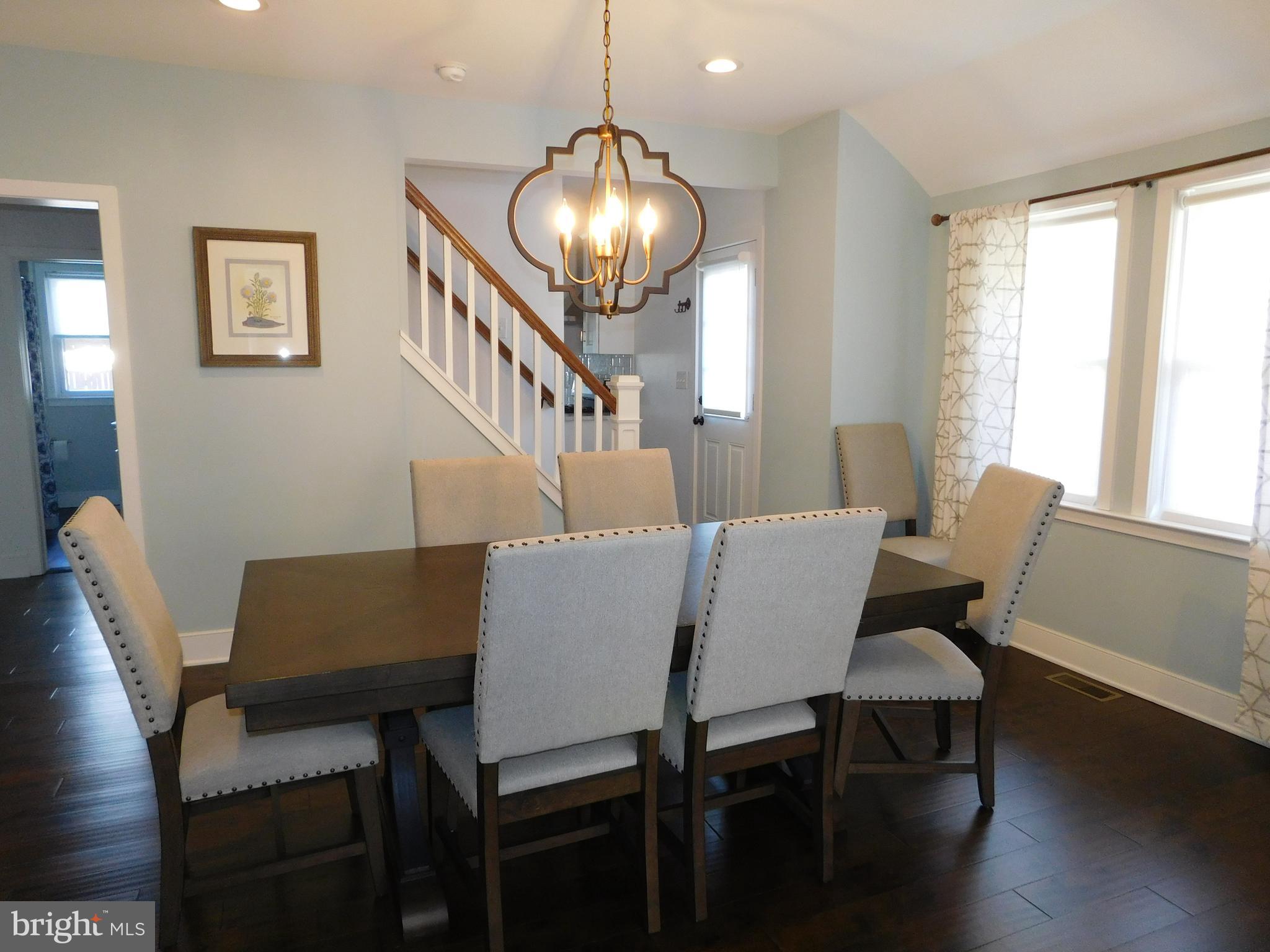 234 Crafton Avenue Pitman, NJ 08071 - Photo 13 of 61 a view of a dining room with furniture window and wooden floor