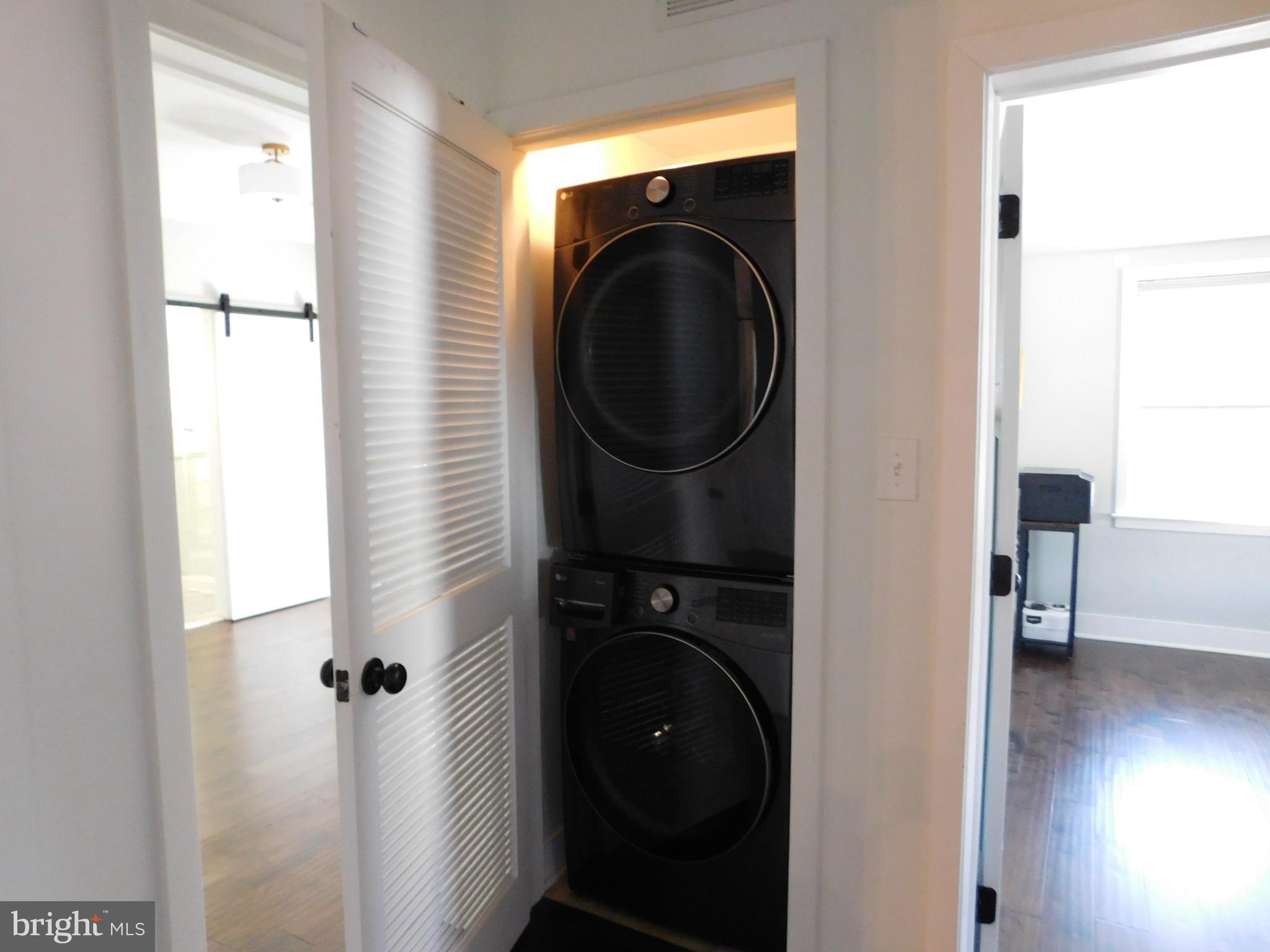 234 Crafton Avenue Pitman, NJ 08071 - Photo 22 of 61 a view of a hallway with washer and dryer