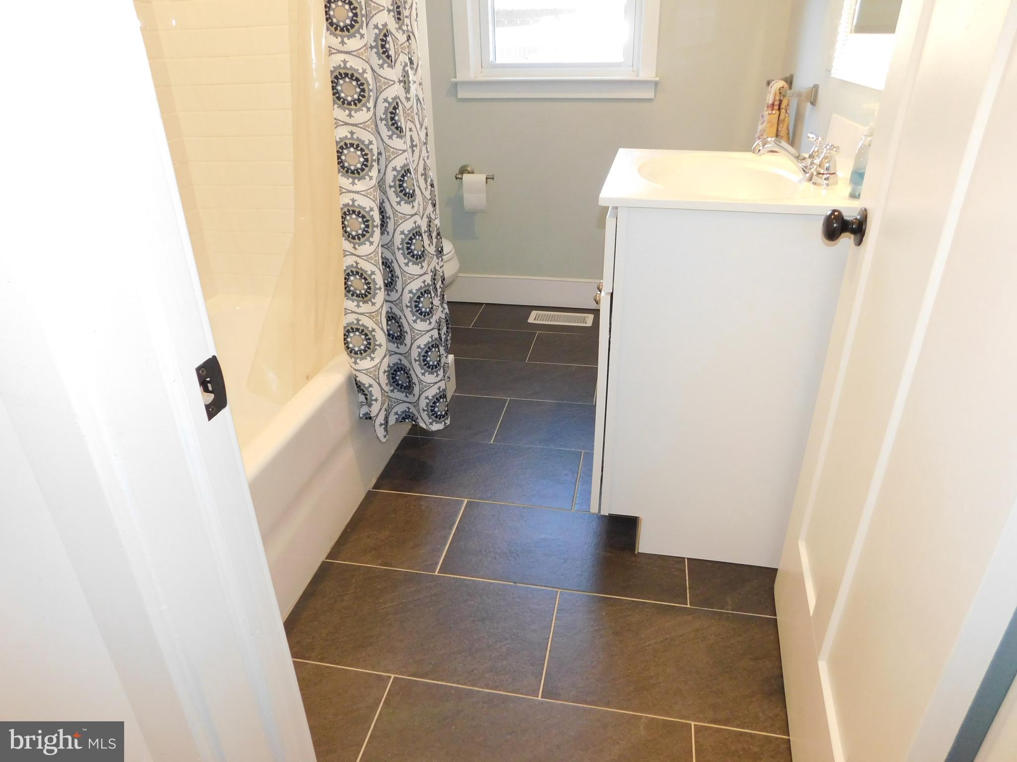 234 Crafton Avenue Pitman, NJ 08071 - Photo 34 of 61 a bathroom with a sink and a shower