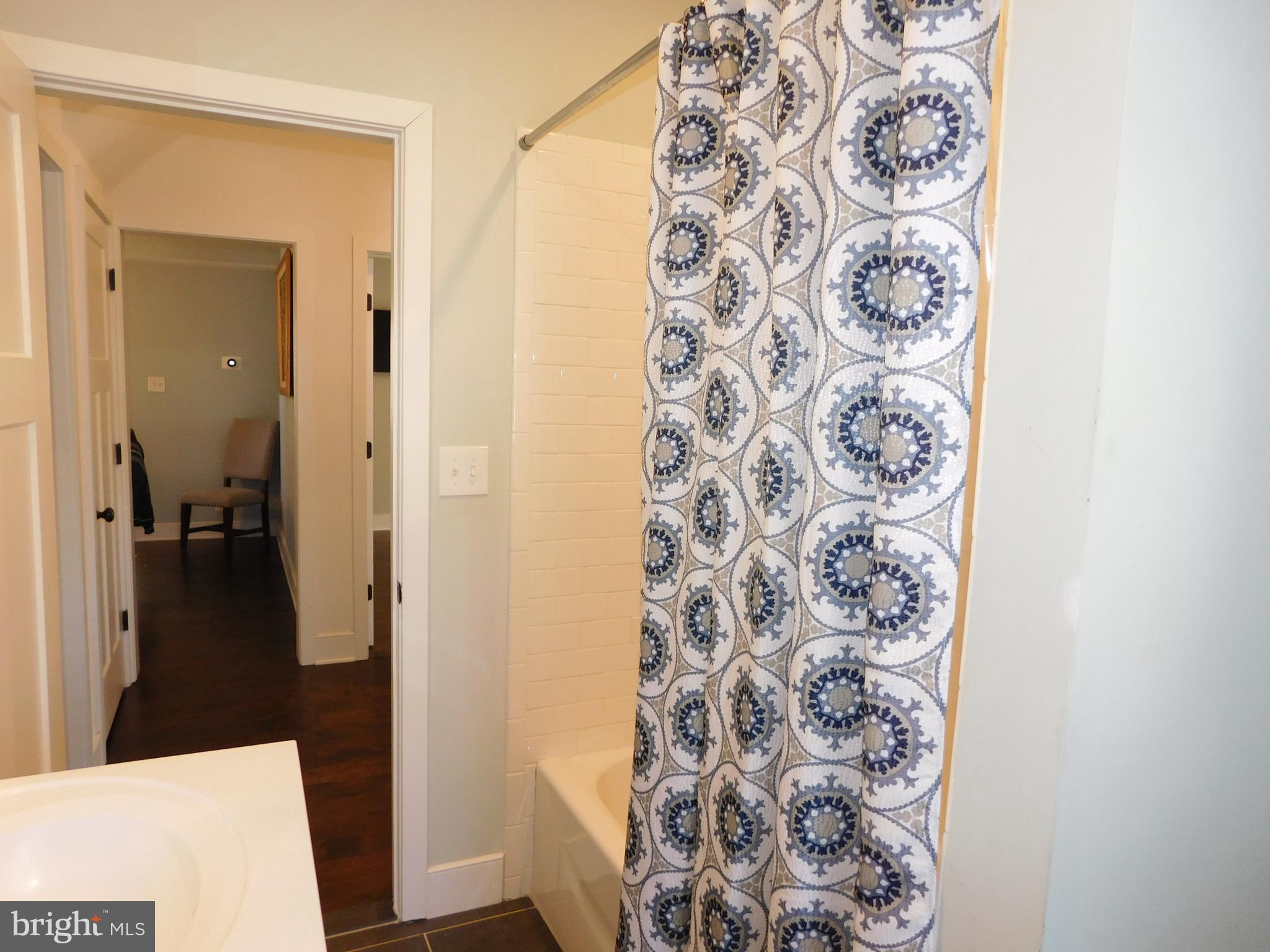 234 Crafton Avenue Pitman, NJ 08071 - Photo 35 of 61 a bathroom with a shower and a sink