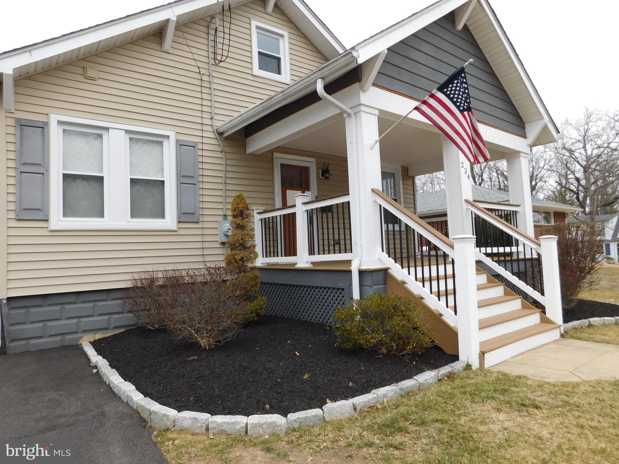 234 Crafton Avenue Pitman, NJ 08071 - Photo 5 of 61 a front view of a house with garage