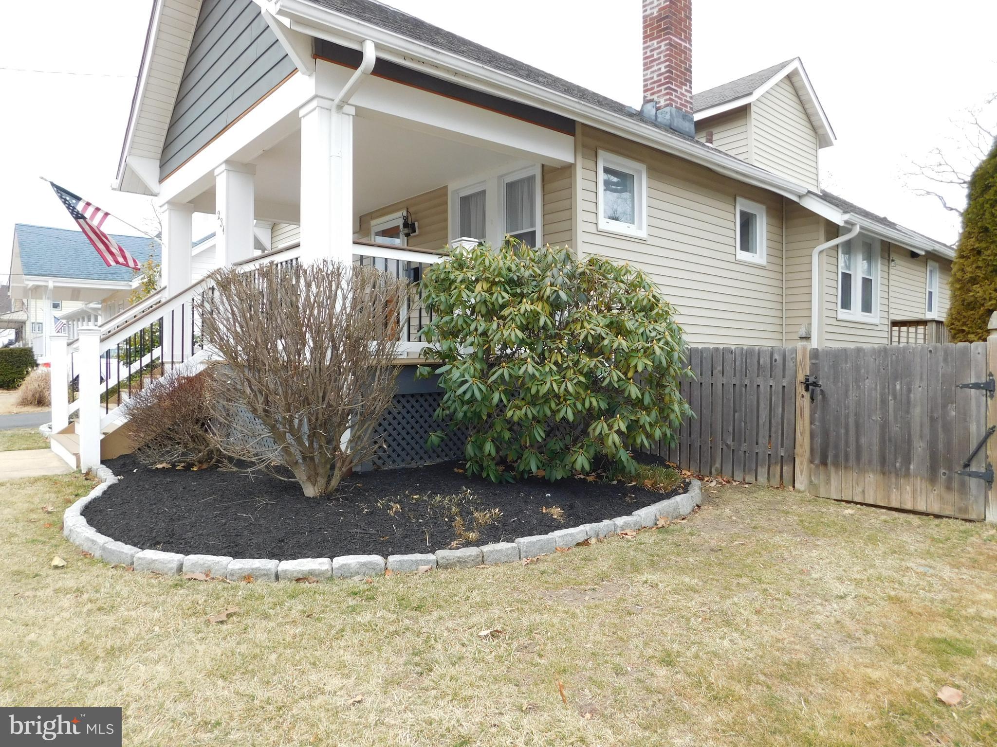 234 Crafton Avenue Pitman, NJ 08071 - Photo 6 of 61 a view of a house with a yard