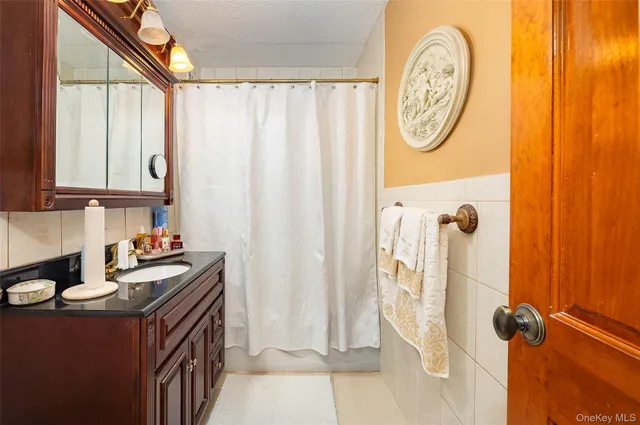 a view of a balcony dining table and chairs