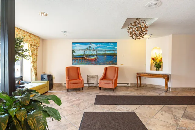 a view of a building with a umbrellas on a street