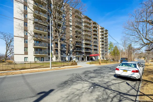a view of a street with houses