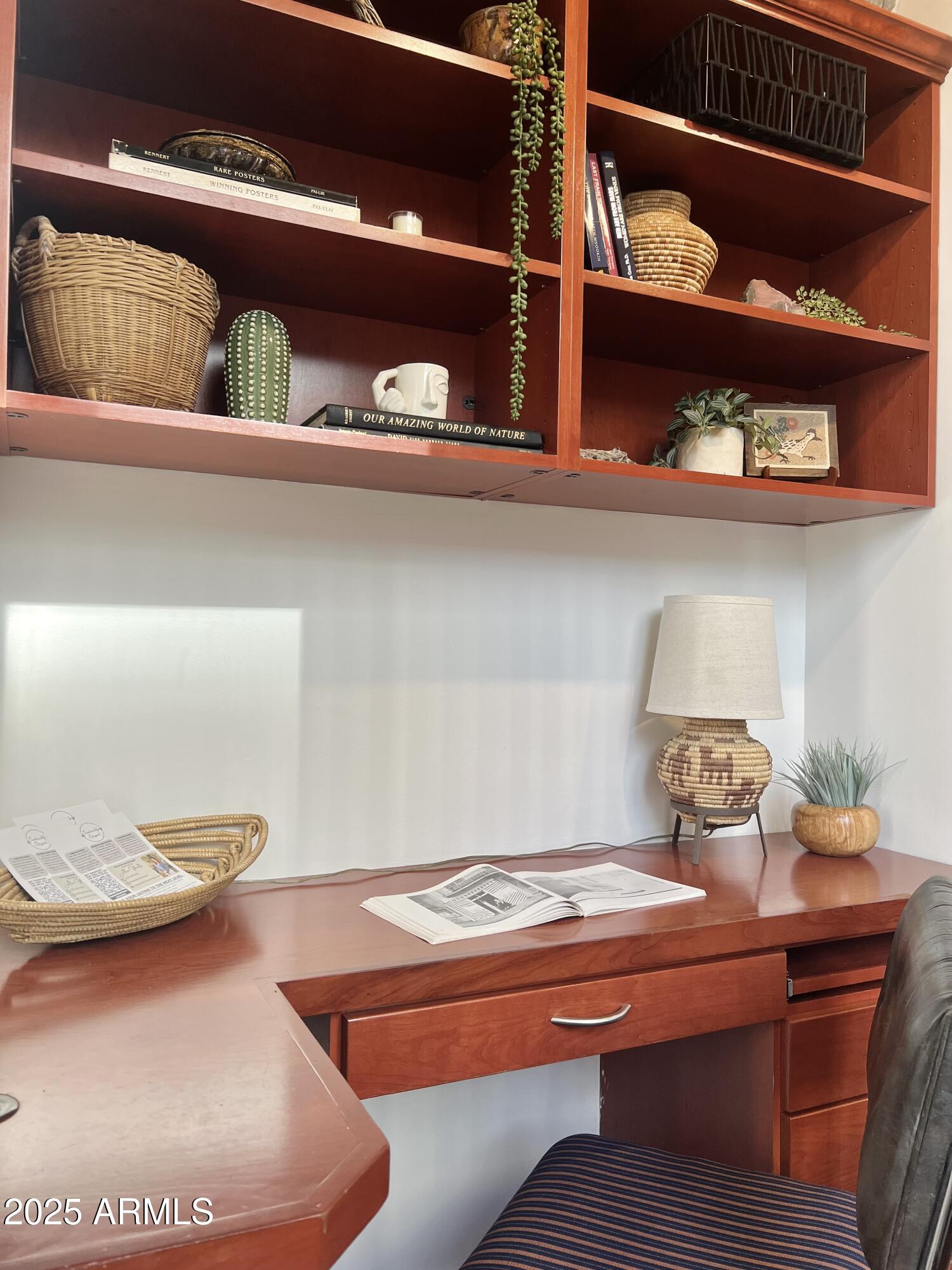 114 West Adams Street, Unit 1007 Phoenix, AZ 85003 - Photo 24 of 51 a room with lots of different colored cloths