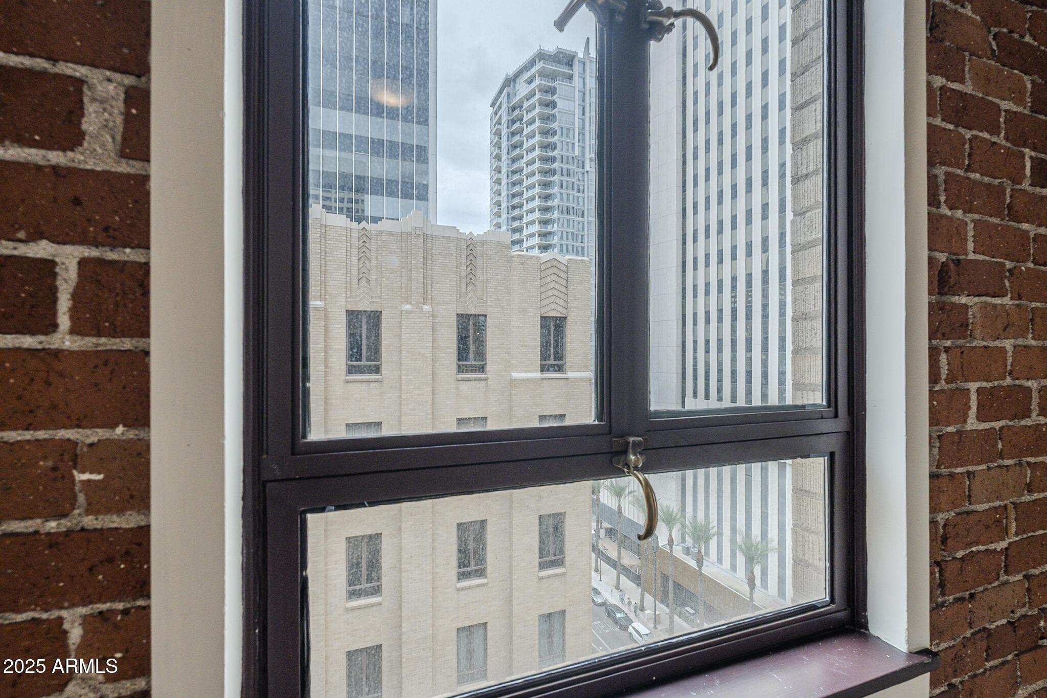114 West Adams Street, Unit 1007 Phoenix, AZ 85003 - Photo 30 of 51 a view of a window of the house