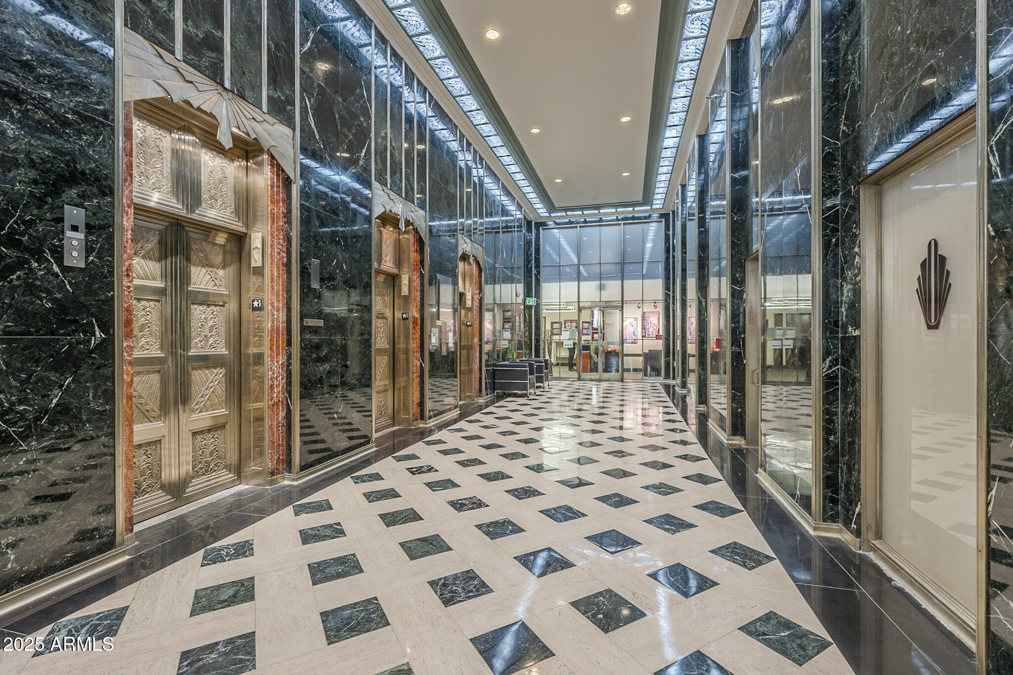 114 West Adams Street, Unit 1007 Phoenix, AZ 85003 - Photo 3 of 51 a building view with a glass door