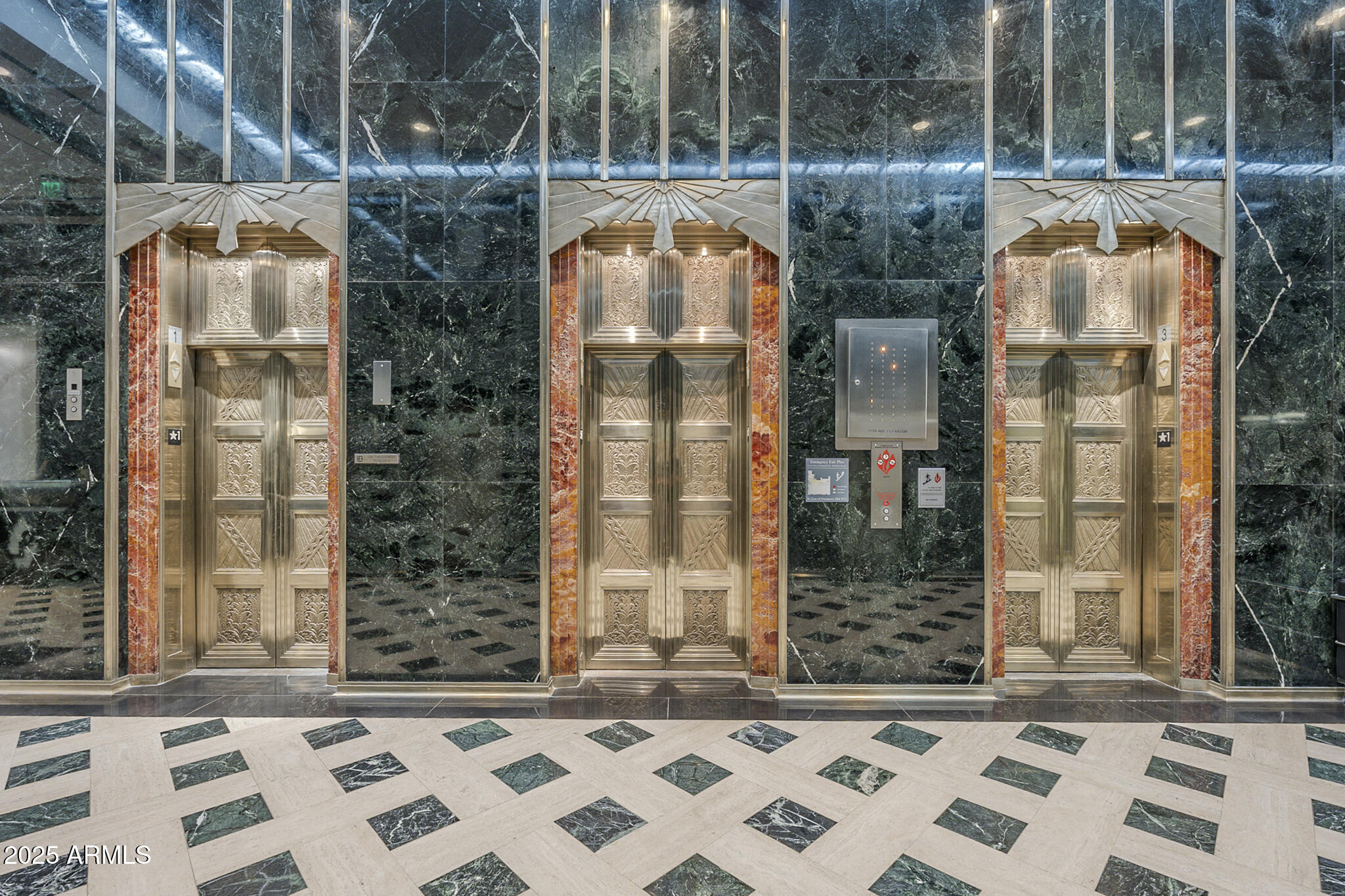 114 West Adams Street, Unit 1007 Phoenix, AZ 85003 - Photo 49 of 51 front view of a building with a glass door