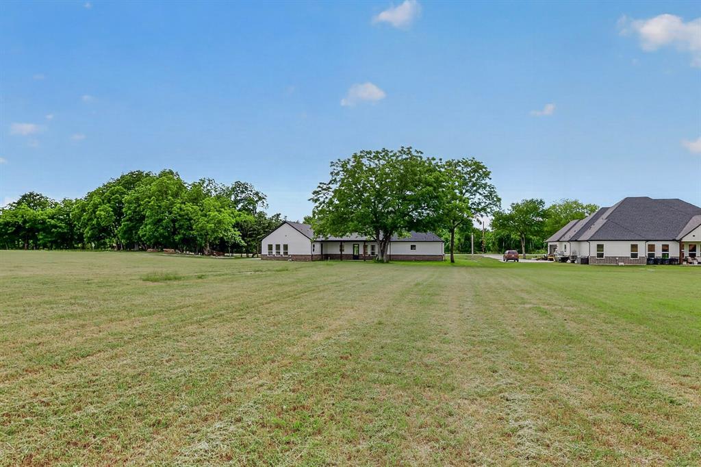 9080 County Road 669 Blue Ridge, TX 75424 - Photo 33 of 40 a view of a field with plants and trees